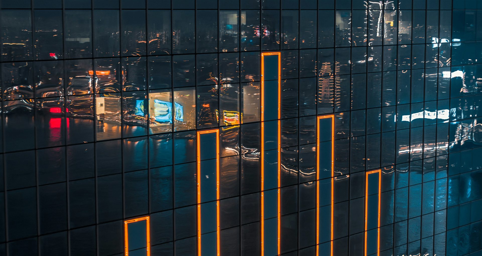 reflection of city buildings on water